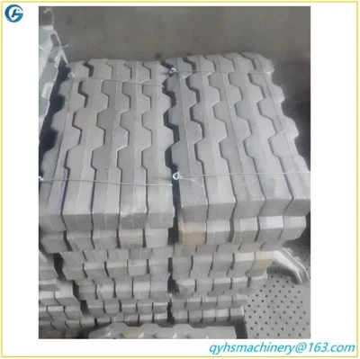 Reciprocating grate ɔhyew-a ɛko tia dade grating bars .